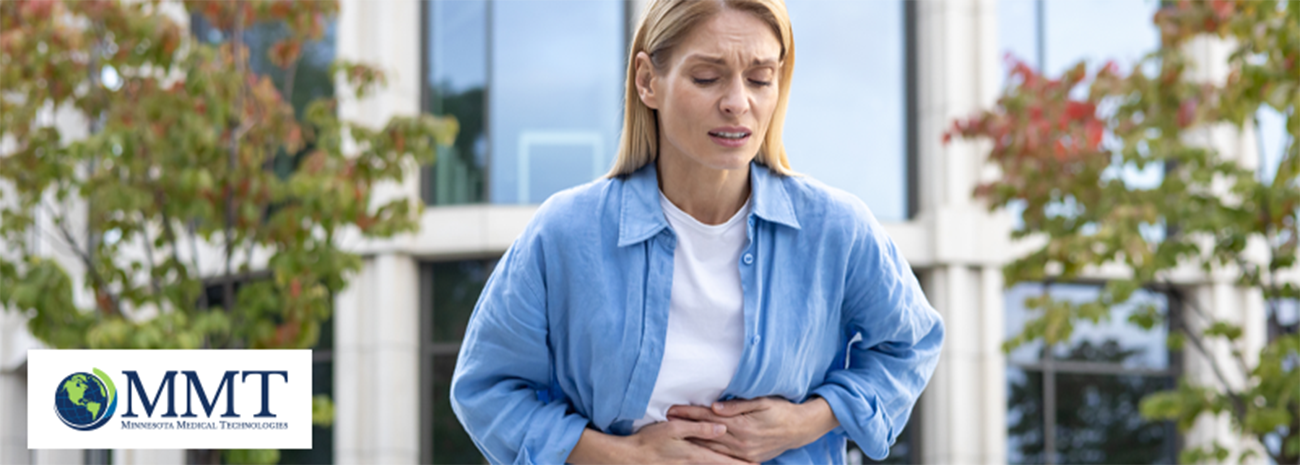 Woman clutching stomach in discomfort to signal bowel movement issues