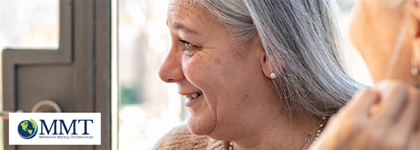 Older woman smiling and looking relieved