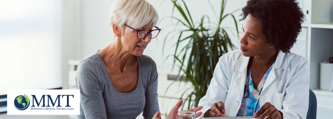 Female patient speaking to female doctor about fecal incontinence