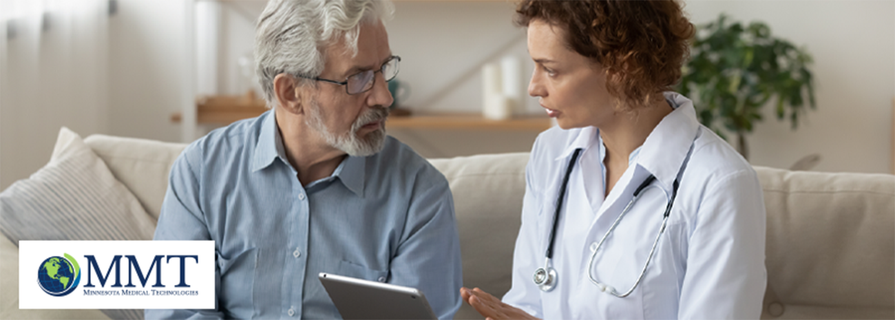 Healthcare provider showing patient chart on tablet