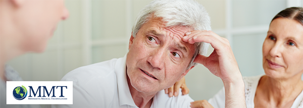 Man looking concerned at another person with his wife offering comfort in the background