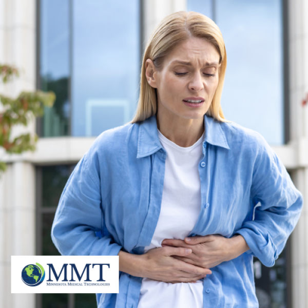 Woman clutching stomach in discomfort to signal bowel movement issues