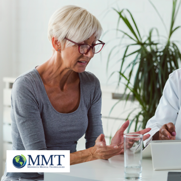 Female patient speaking to female doctor about fecal incontinence
